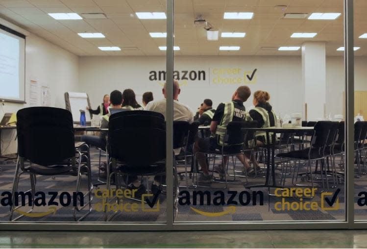 Employees sit in a classroom through Amazon's Career Choice program.