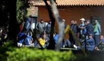 Detained fans of Boca Juniors football club are pictured at the headquarters of the Special Operations Forces of the Paraguayan Police in Asuncion, Paraguay, April 29, 2016. . REUTERS/Jorge Adorno