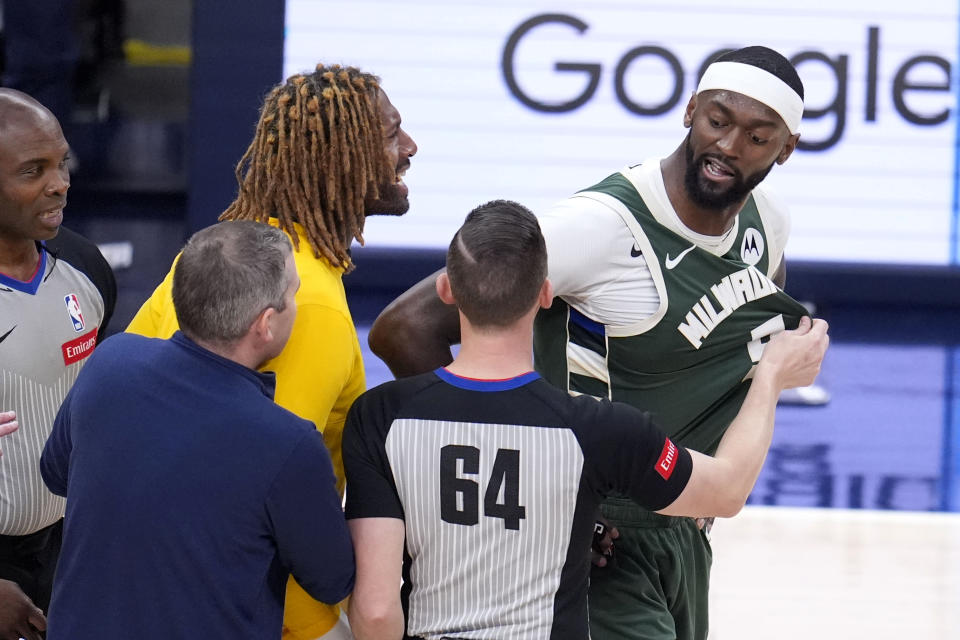 Milwaukee Bucks forward Bobby Portis, right, reacts after being called for a technical foul during the second half against the Indiana Pacers in Game 6 in an NBA basketball first-round playoff series, Thursday, May 2, 2024, in Indianapolis. (AP Photo/Michael Conroy)