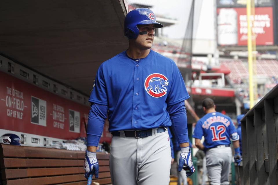Anthony Rizzo is dealing with back issues after a bad night of sleep. (AP Photo/John Minchillo)