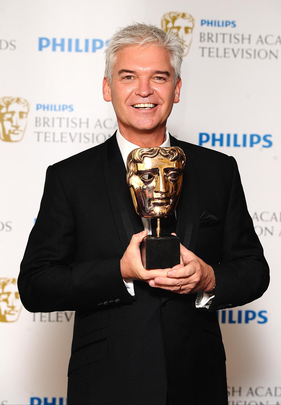 Phillip Schofield with the Entertainment Programme award received for The Cube at the Philips British Academy Television Awards at the Grosvenor House, 90 Park Lane, London.