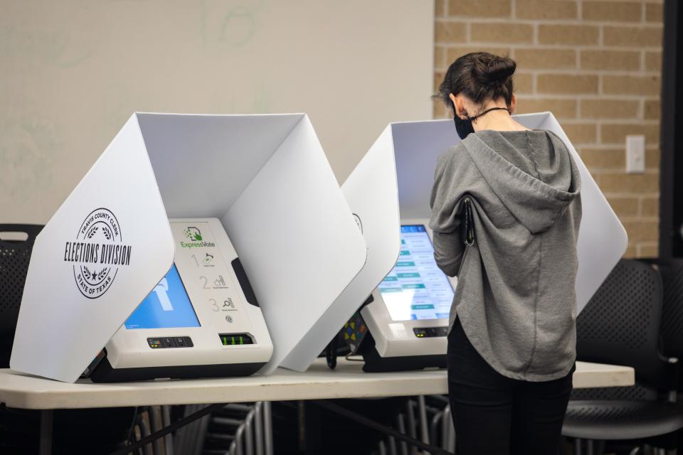 AUSTIN, TX: People vote at the Carver Branch Library on March 1, 2022 in Austin, Texas. Texans voted in the states first primary of the 2022 midterm election season. The state was among those where election officials have warned of paper shortages. (Photo by Montinique Monroe/Getty Images)