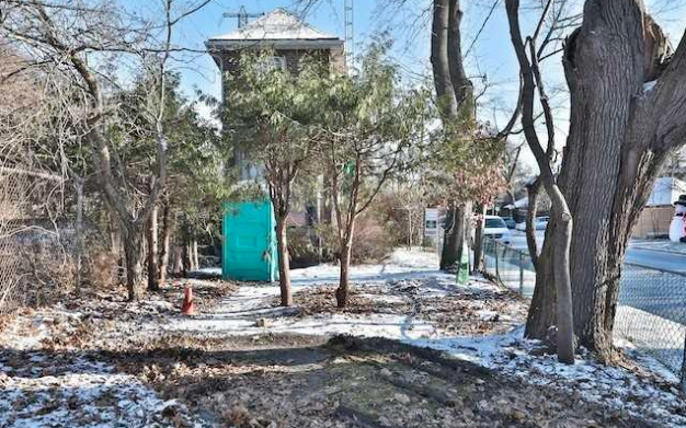 Maybe you can convert this port-o-potty into a garden shed. (Zoocasa)