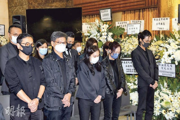 Family members and friends paid their respects to the late Ng Man Tat