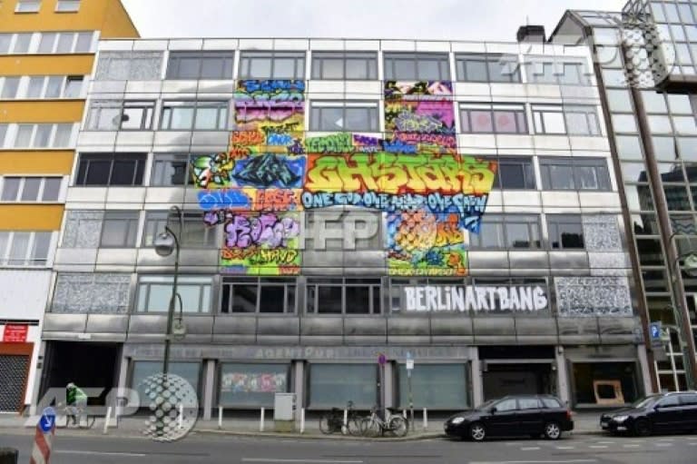 A condemned bank building in Berlin is the unlikely -- and temporary -- stage for artworks by 165 street artists, but only until the bulldozers roll in