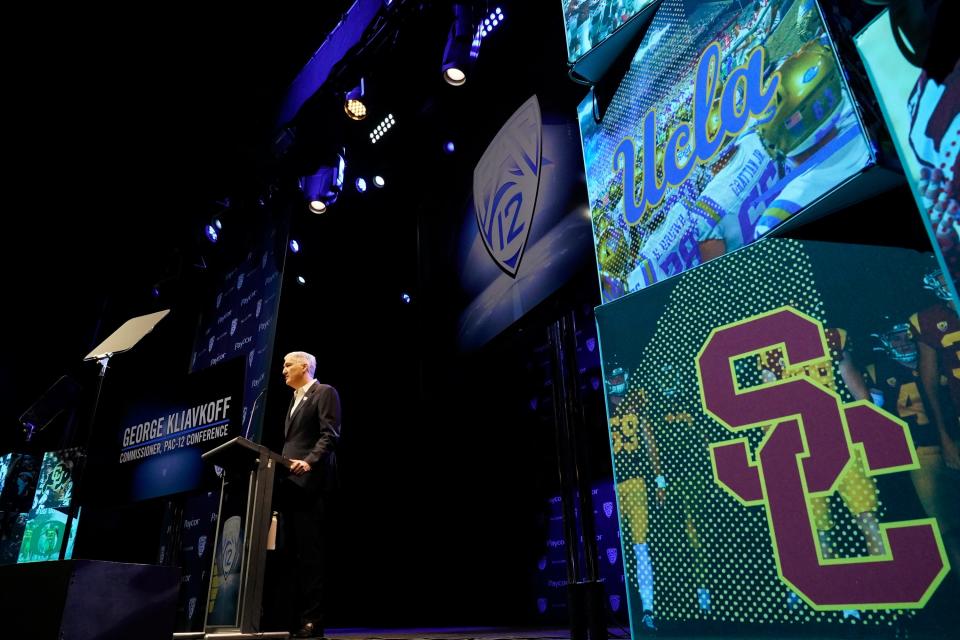 Pac-12 Conference commissioner George Kliavkoff speaks at the Pac-12 NCAA college football media day Friday, July 29, 2022, in Los Angeles. (AP Photo/Damian Dovarganes)