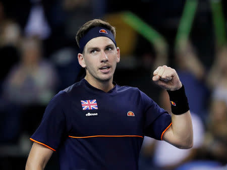 FILE PHOTO: Tennis - Davis Cup - World Group Play Off - Great Britain v Uzbekistan - Emirates Arena, Glasgow, Britain - September 16, 2018 Britain's Cameron Norrie celebrates winning his match against Uzbekistan's Sanjar Fayziev REUTERS/Russell Cheyne