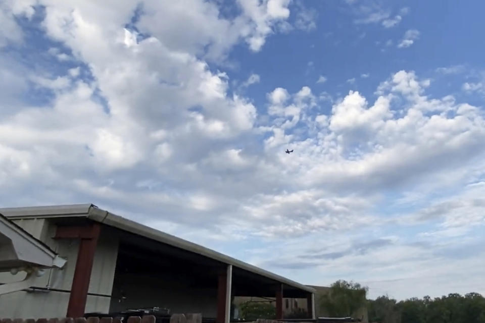 A small airplane circles over Tupelo (Rachel McWilliams via AP)