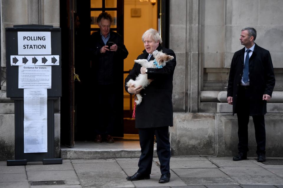 LONDON, UNITED KINGDOM - DECEMBER 12: UK Prime Minister Boris Johnson departs after casting his vote at Methodist Hall polling station on December 12, 2019 in London, England. The current Conservative Prime Minister Boris Johnson called the first UK winter election for nearly a century in an attempt to gain a working majority to break the parliamentary deadlock over Brexit. The election results from across the country are being counted overnight and an overall result is expected in the early hours of Friday morning. (Photo by Kate Green/Anadolu Agency via Getty Images)