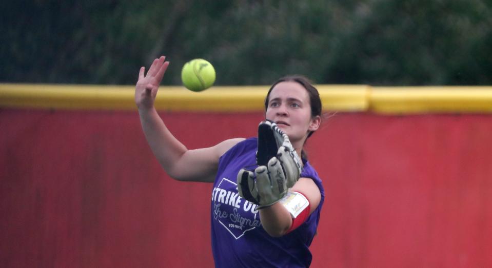 Rossville Hornets outfielder Cortney Huffman (18) catches a fly ball during the IHSAA softball game against the Carroll Cougars, Thursday, May 2, 2024, at Rossville High School in Rossville, Ind. Rossville won 2-1.