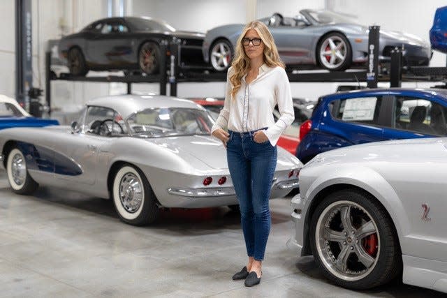 Addison Brown, seen here on May 31, 2023, at Cascio Motors in Scottsdale, Arizona, is fighting to regain custody of four Ford F-150 pickups she says she purchased legally with legitimate Arizona titles for an estimated $300,000. A car dealership that Brown co-owns with her husband was raided by armed police officers on Dec. 23. After Cascio purchased the pickup trucks, Ford reported them stolen.  Now Brown has been banned from buying at auction houses or borrowing money for the company while also having to pay off all bonds that protected her dealership. She says she has been battered financially after unknowingly selling to an auction house a stolen vehicle that had not been reported stolen by Ford.