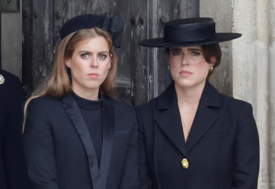 Princess Beatrice Windsor and Princess Eugenie Windsor attend The State Funeral Of Queen Elizabeth II at Westminster Abbey on September 19, 2022 in London, England. Elizabeth Alexandra Mary Windsor was born in Bruton Street, Mayfair, London on 21 April 1926. She married Prince Philip in 1947 and ascended the throne of the United Kingdom and Commonwealth on 6 February 1952 after the death of her Father, King George VI. Queen Elizabeth II died at Balmoral Castle in Scotland on September 8, 2022, and is succeeded by her eldest son, King Charles III. (Photo by Chris Jackson/Getty Images)