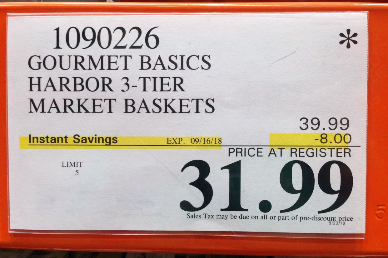 instant savings sign at Costco