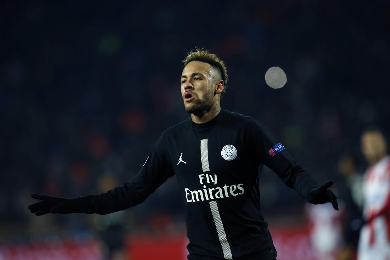 PSG forward Neymar celebrates after scoring his side' second goal during the Champions League group C soccer match between Red Star and Paris Saint Germain, in Belgrade, Serbia, Tuesday, Dec. 11, 2018. (AP Photo/Darko Vojinovic)