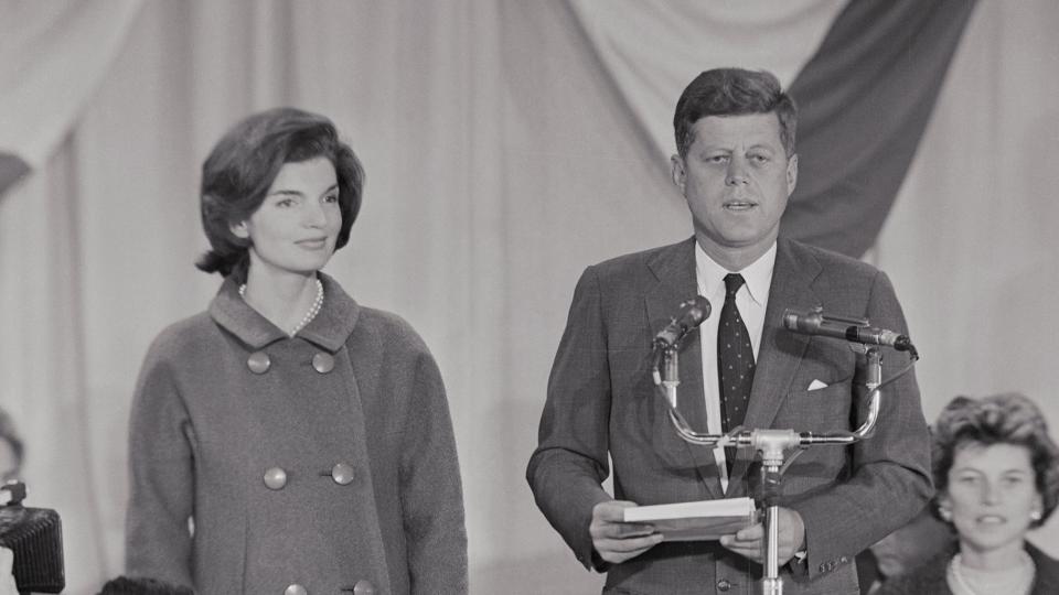 John F. Kennedy delivers his acceptance speech after the presidential election on November 9, 1960. His wife Jackie stands at his side at the Kennedy Press Headquarters