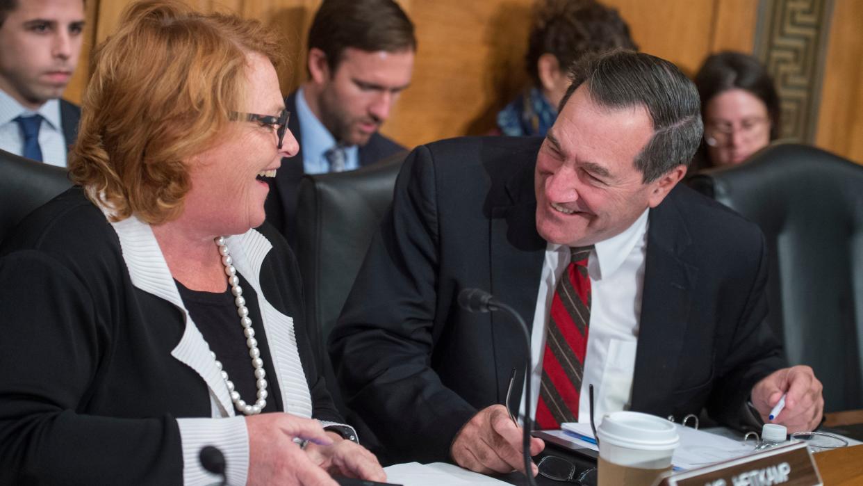 Sens. Heidi Heitkamp (D-N.D.) and Joe Donnelly (D-Ind.) are in tight re-election races this year. The Trump administration&nbsp;backed a lawsuit this week challenging the constitutionality of a popular Obamacare provision, putting Republicans on the defensive before the midterms. (Photo: Tom Williams / Getty Images)