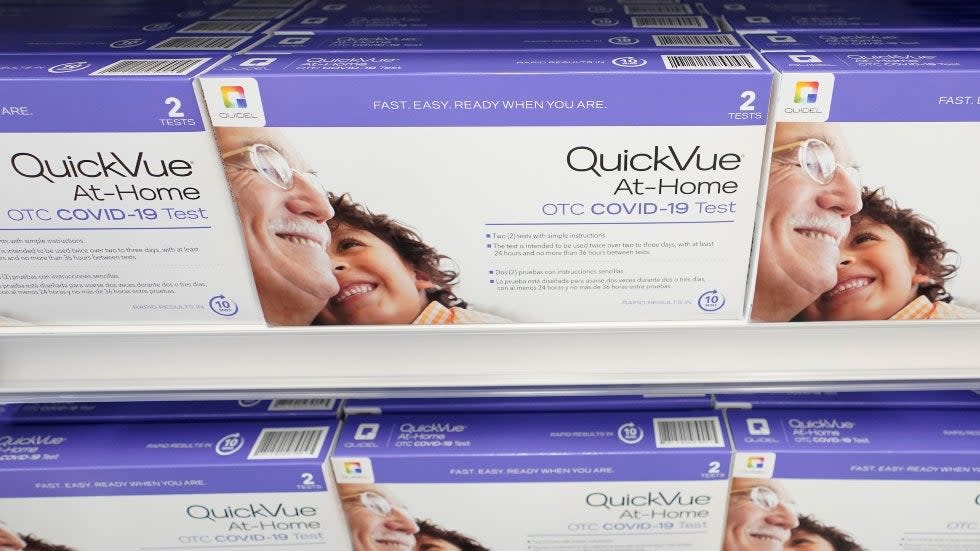 Boxes QuickVue home COVID-19 tests made by Quidel are shown for sale