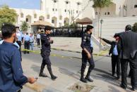 Police cordon off the area where writer Nahed Hattar was killed outside the court in Amman where he was facing charges for sharing a cartoon deemed offensive to Islam, on September 25, 2016 Hattar was struck by three bullets before the assailant was arrested, said Petra. Witnesses told AFP that a man had opened fire in front of the court in Amman's Abdali district