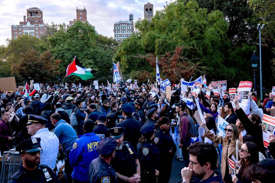 PHOTO: Counter-protestors, who are pro-Israel, chant across a line of police officers towards a vigil organized by NYU students in support of Palestinians in Washington Square Park in New York City on Oct.17, 2023. (Alex Kent/Getty Images, FILE)