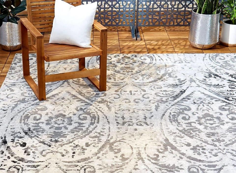 This trendy rug can tie your indoor or outdoor space together.