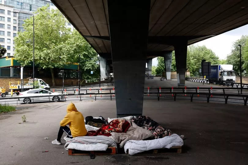 Sham sits in his makeshift bed under the Westway flyover in Paddington in London, Britain 10 June 2024