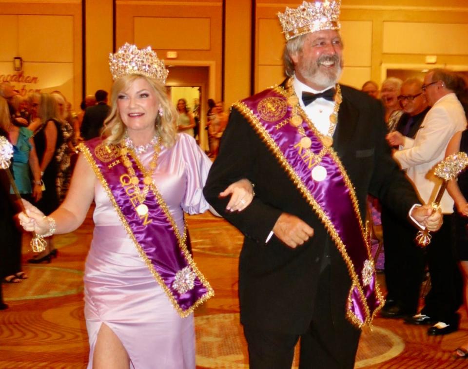 Krewe of Gemini XXXV Queen Betty Amy Reeves and KingRoger Lites make their entrance at the krewe's coronation event.