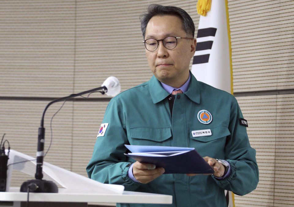 South Korean Vice Health Minister Park Min-soo arrives to hold a briefing at the government complex in Sejong, South Korea, Tuesday, March 12, 2024. South Korea's government expressed deep regret over the news that some senior doctors could join the protracted walkouts by thousands of junior doctors, saying Tuesday the people won’t understand another collective action that threatens the lives of patients. (Bae Jae-man/Yonhap via AP)