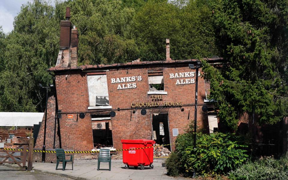 The burnt out remains of the pub on Monday, following the fire