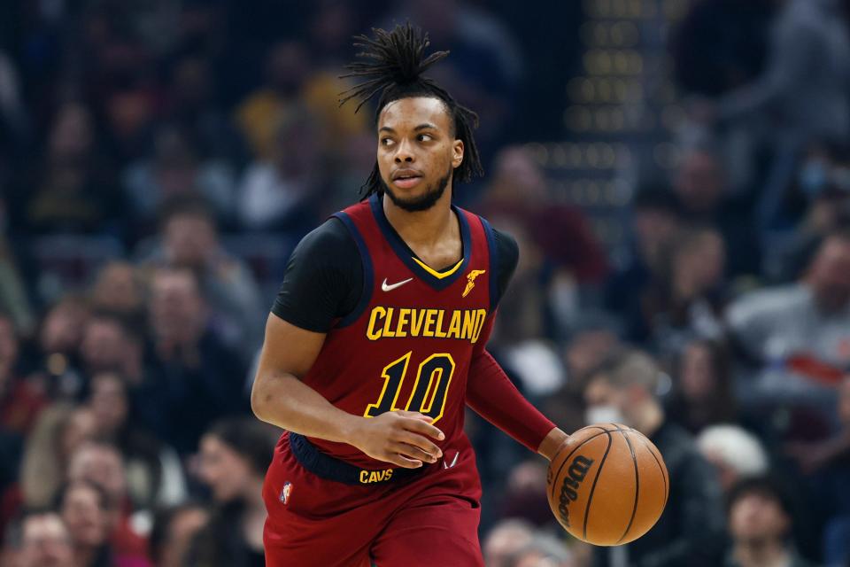 Cleveland Cavaliers' Darius Garland brings the ball up the court against the Charlotte Hornets during the first half of an NBA basketball game, Wednesday, March 2, 2022, in Cleveland. (AP Photo/Ron Schwane)