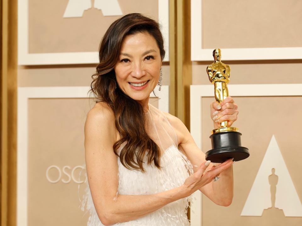 Michelle Yeoh poses with her Oscar in 2023.