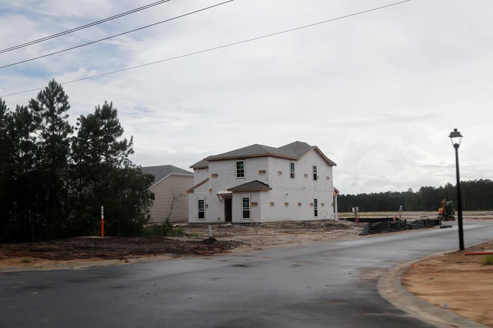 Homes are being built in a new neighborhood under development on Little Neck Road.