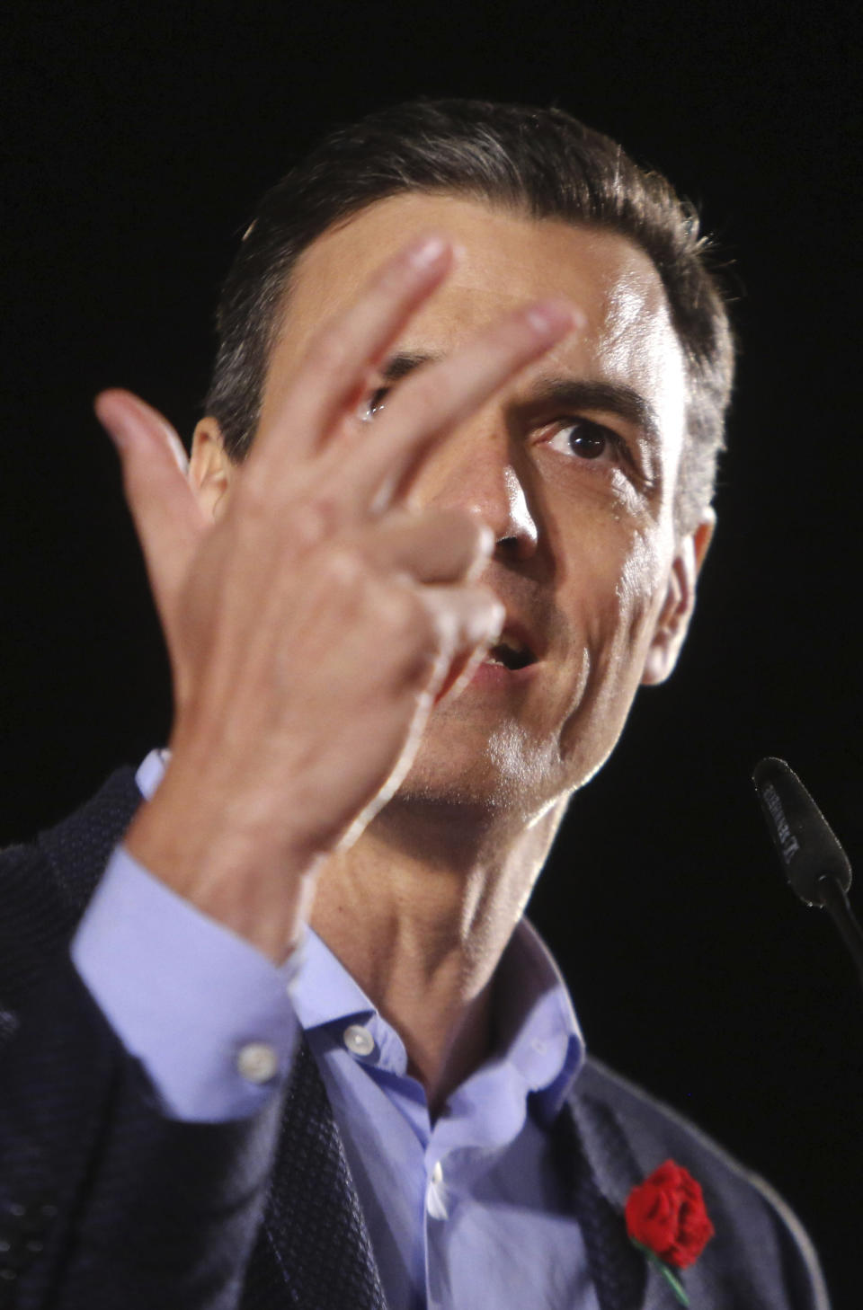 Spain's Prime Minister and Socialist Party candidate Pedro Sanchez speaks to supporters during the closing campaign event in Valencia, Spain, Friday April 26, 2019. Appealing to Spain's large pool of undecided voters, top candidates on both the right and left are urging Spaniards to choose wisely and keep the far-right at bay in Sunday's general election. (AP Photo/Alberto Saiz)