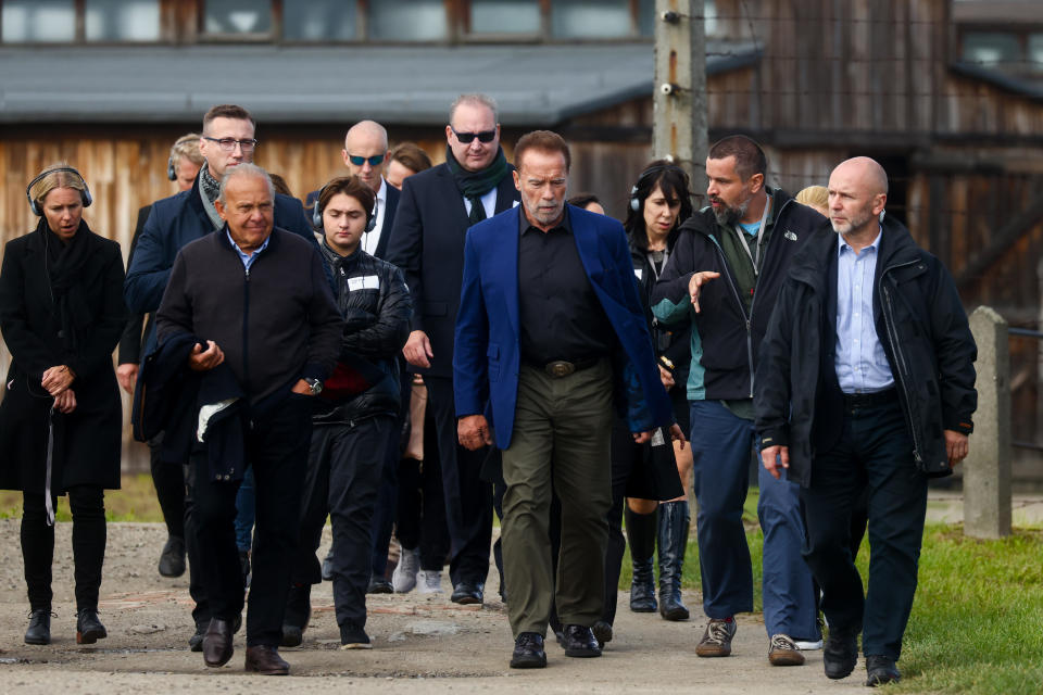 Arnold Schwarzenegger makes his first visit to the former Nazi German Auschwitz Birkenau concentration and extermination camp in Brzezinka, Poland on September 28, 2022.  / Credit: Beata Zawrzel/NurPhoto via Getty Images