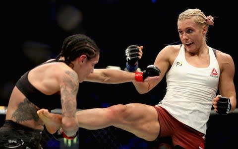 Yana Kunitskaya of Russia (R) gets her leg caught by Lina Lansberg of Sweden (L) in their women's bantamweight bout  - Credit: Christian Petersen/Zuffa LLC