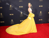 <p>For the 2021 ceremony, Anya Taylor-Joy chose a beautiful cream satin gown by Dior Haute Couture. She paired the frock with a dramatic yellow train and sparkling Tiffany & Co. jewellery. (Image via Jay L. Clendenin/Los Angeles Times via Getty Images)</p> 