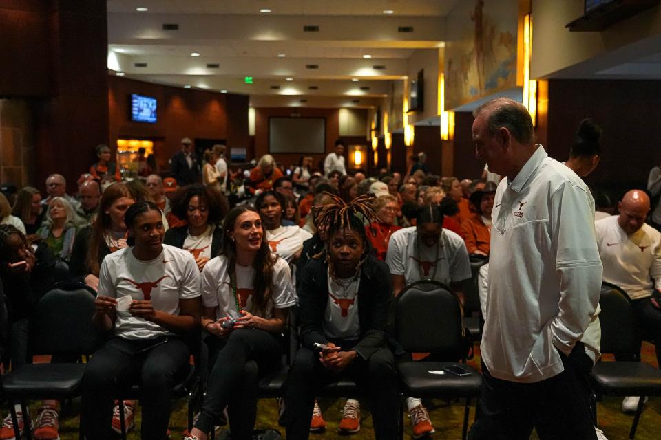 Texas women's basketball coach Vic Schaefer sits with his team during Sunday's broadcast of the NCAA Selection Sunday show. The Longhorns are a No. 1 seed heading into the NCAA Tournament.