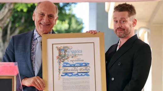 L-R) Steve Nissen, President and CEO of HCC and Macaulay Culkin attend the ceremony honoring Macaulay Culkin with a Star on the Hollywood Walk of Fame on December 01, 2023 in Hollywood, California. (Photo by Amy Sussman/Getty Images)