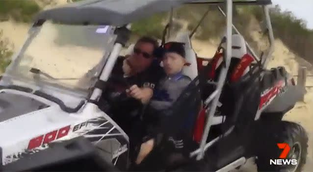 Mr Reoach in his buggy with his father. Photo: 7 News