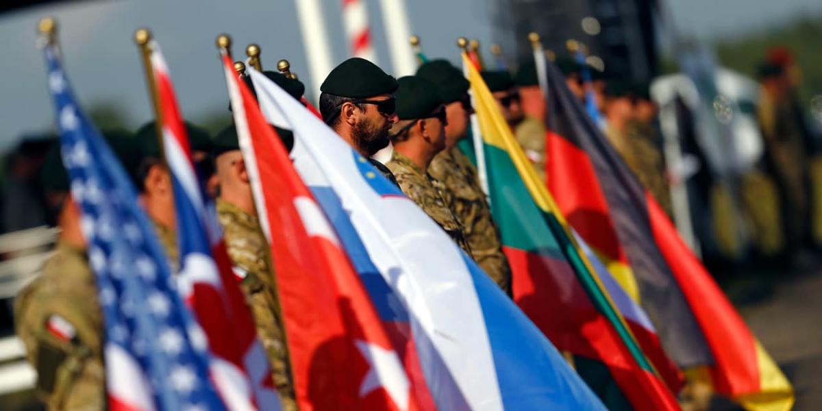 What are the advantages of becoming a member of NATO?