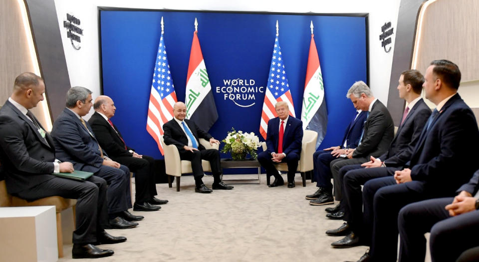 U.S. President Donald Trump meets with Iraq's President Barham Salih during the 50th World Economic Forum (WEF) annual meeting in Davos