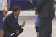 <p>But quickly got shy and snubbed Prime Minister Justin Trudeau’s high five. [Photo: Youtube] </p>