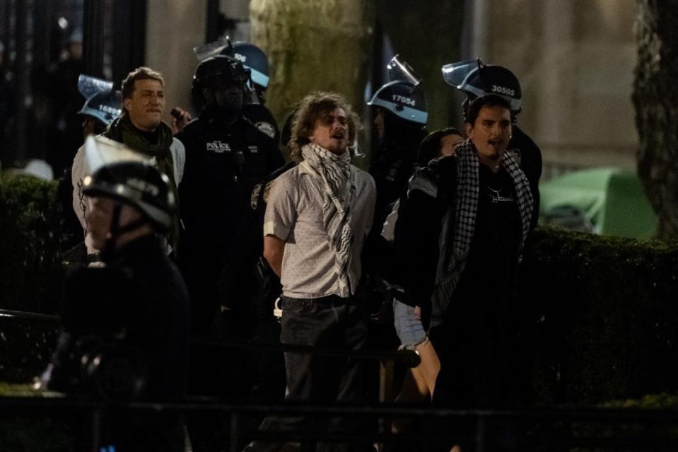 A protester is arrested at Hamilton Hall at Columbia University on Tuesday night. Getty Images