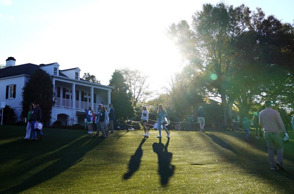 The morning sun rises over the clubhouse at Augusta National Golf Club clubhouse on Sunday during the Drive, Chip & Putt National Finals.
