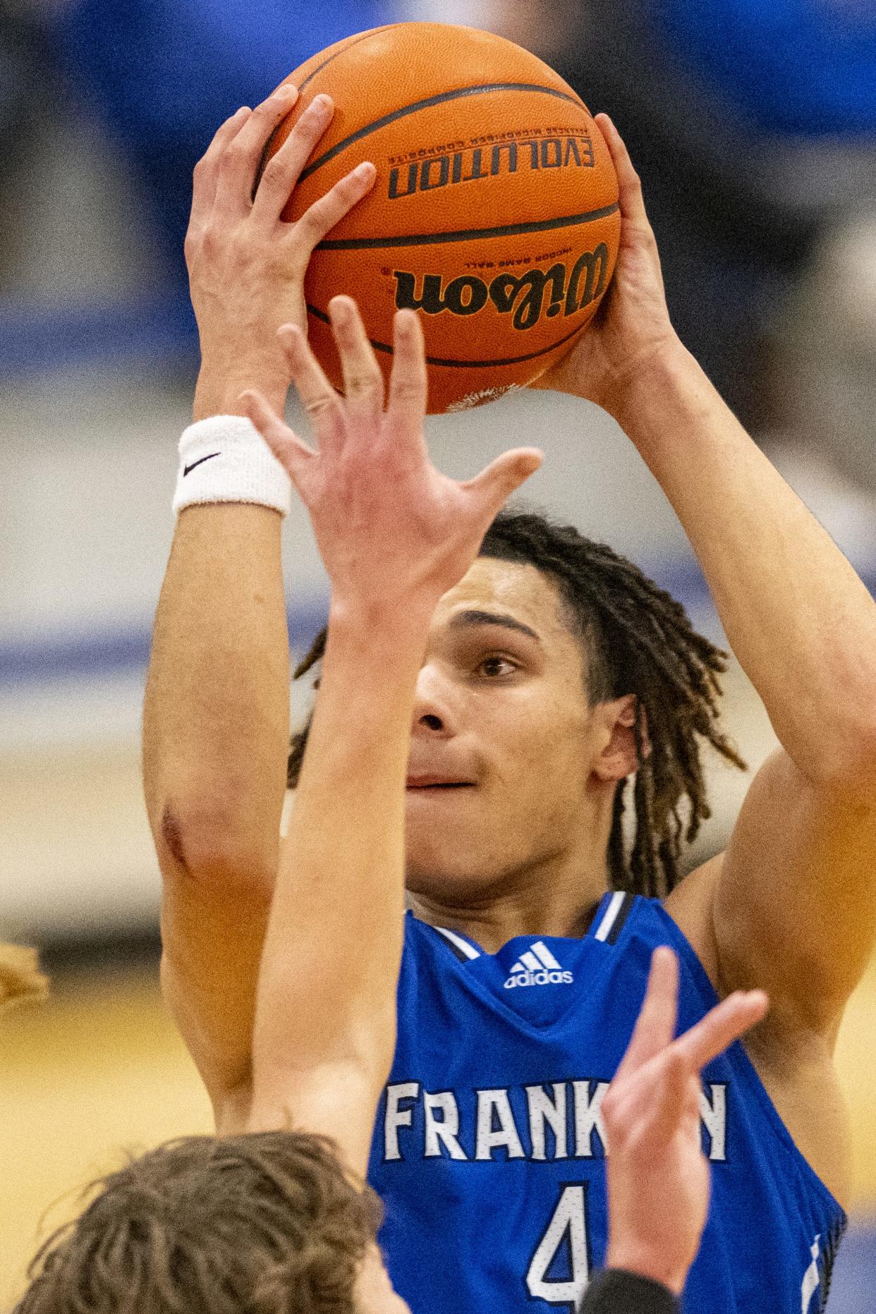 Franklin Community High School senior Micah Davis (4) shoots during the second half of an IHSAA basketball game against Whiteland High School, Tuesday, Jan. 9, 2024, at Whiteland High School. Whiteland High School won, 67-64.