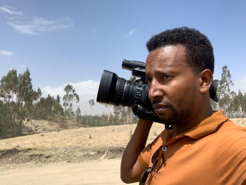 A photograph taken from the family album shows Reuters cameraman Kumerra Gemechu as he arrives to cover a breaking news assignment in Bishoftu