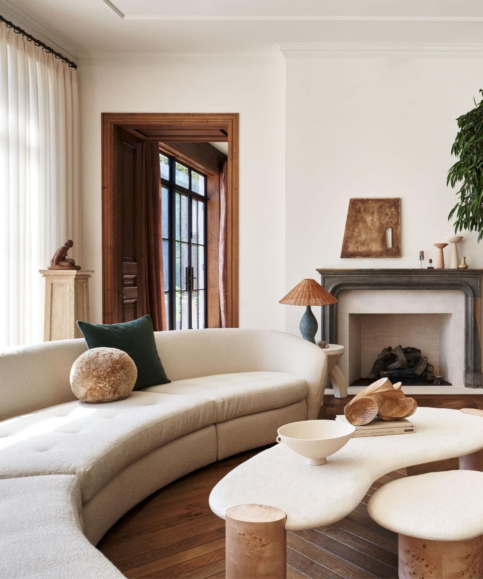 Living room with white curved sofa