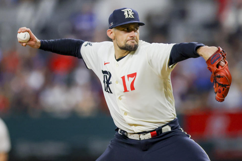 Texas Rangers pitcher Nathan Eovaldi delivers in the sixth inning of a baseball game against the Houston Astros, Saturday, July 1, 2023, in Arlington, Texas. (AP Photo/Gareth Patterson)