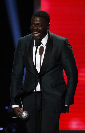 49th NAACP Image Awards – Show – Pasadena, California, U.S., 15/01/2018 – Daniel Kaluuya accepts the Outstanding Actor in a Motion Picture award for "Get Out." REUTERS/Mario Anzuoni/Files