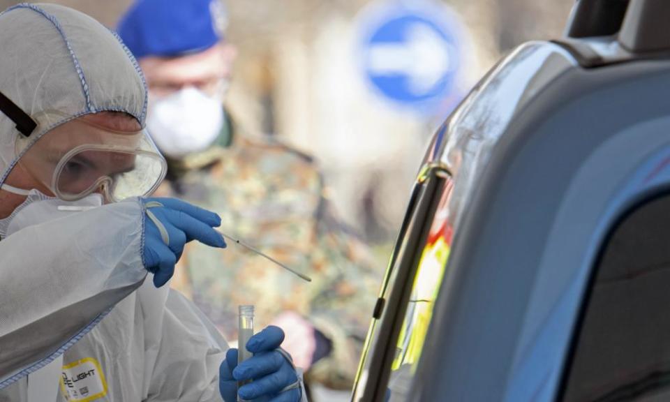 <span>Photograph: Jens Meyer/AP</span>