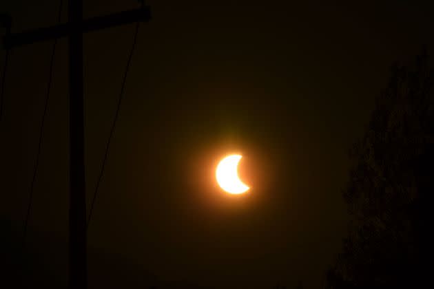 A partial solar eclipse is seen in Srinagar, India. A maximum obstruction of the solar disk at 55% was witnessed in the city. (Photo: Muzamil Mattoo/NurPhoto via Getty Images)